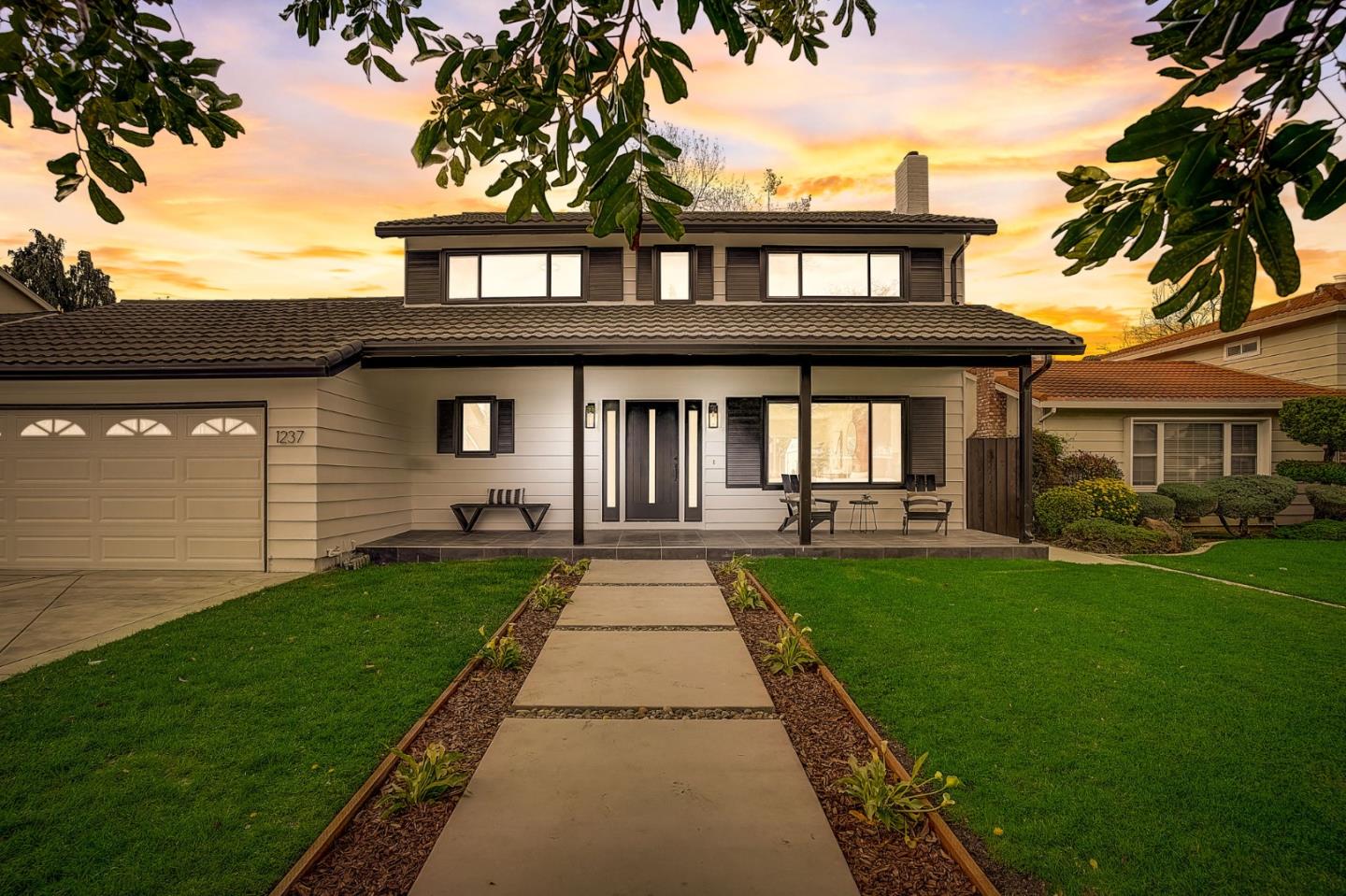 front view of a house with a yard