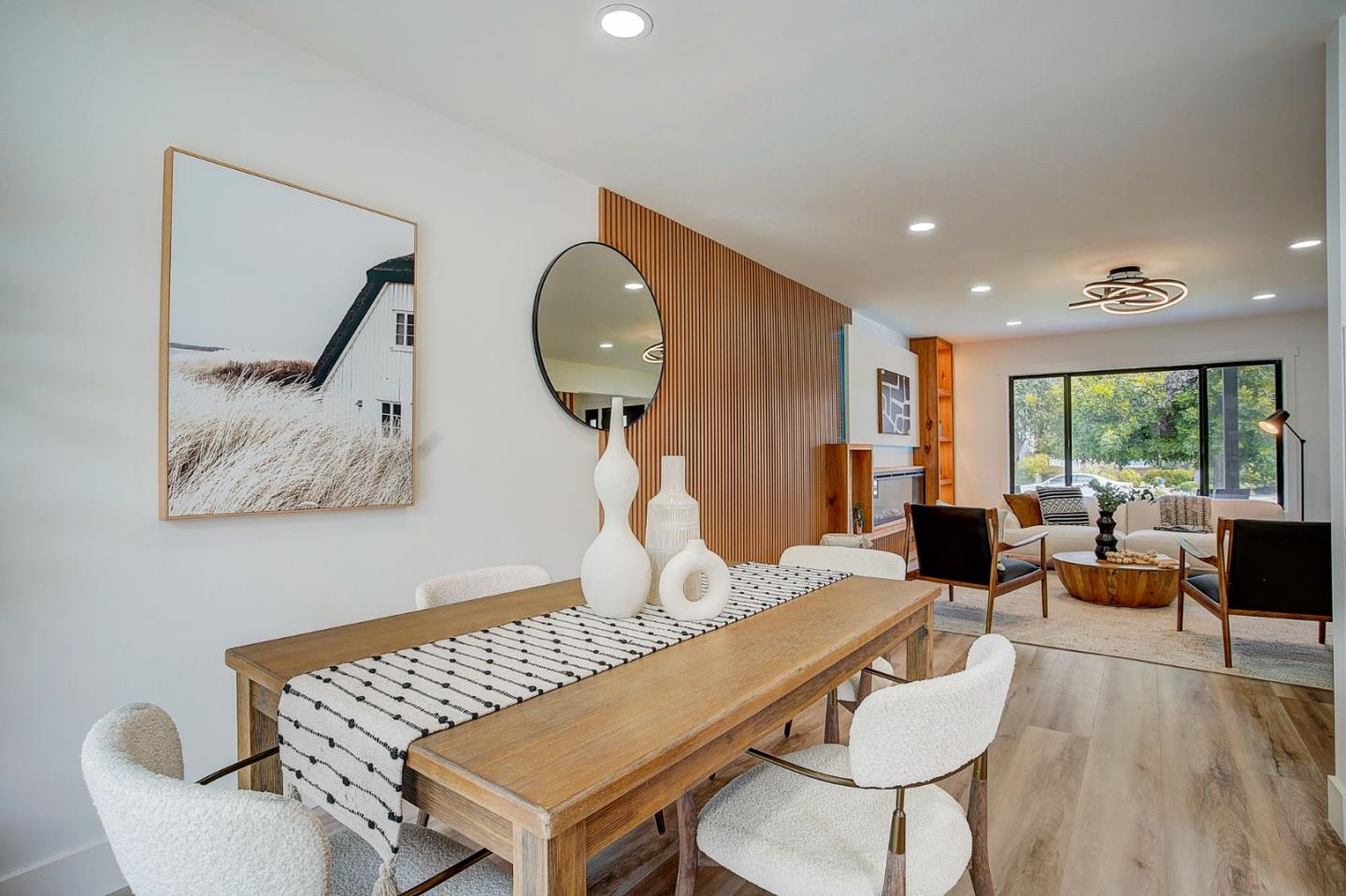 1237 Collins Lane San Jose, CA 95129 - Photo 16 of 56 a living room with furniture a rug and a large window