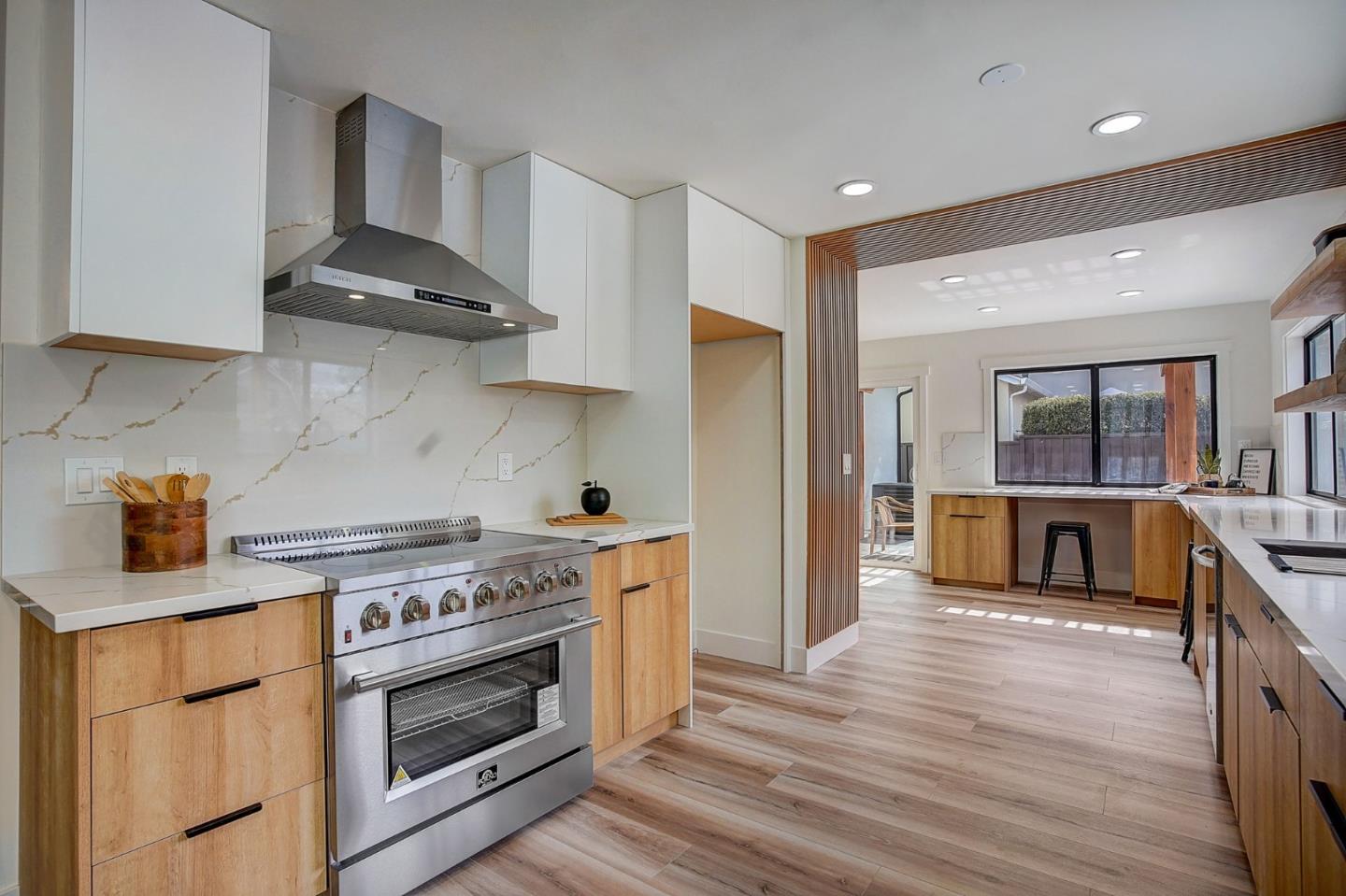 1237 Collins Lane San Jose, CA 95129 - Photo 17 of 56 a kitchen with stainless steel appliances a stove a sink and a refrigerator