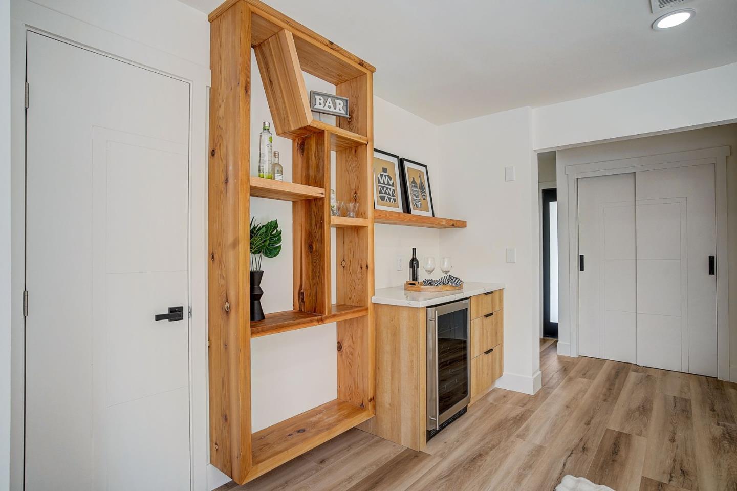 1237 Collins Lane San Jose, CA 95129 - Photo 24 of 56 a view of a kitchen with furniture and wooden floor
