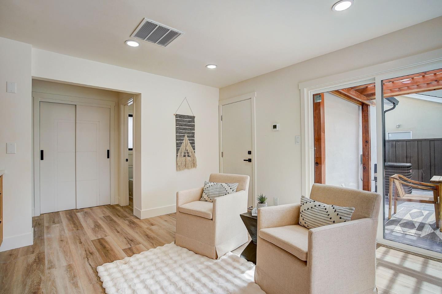 1237 Collins Lane San Jose, CA 95129 - Photo 26 of 56 a living room with furniture and a wooden floor