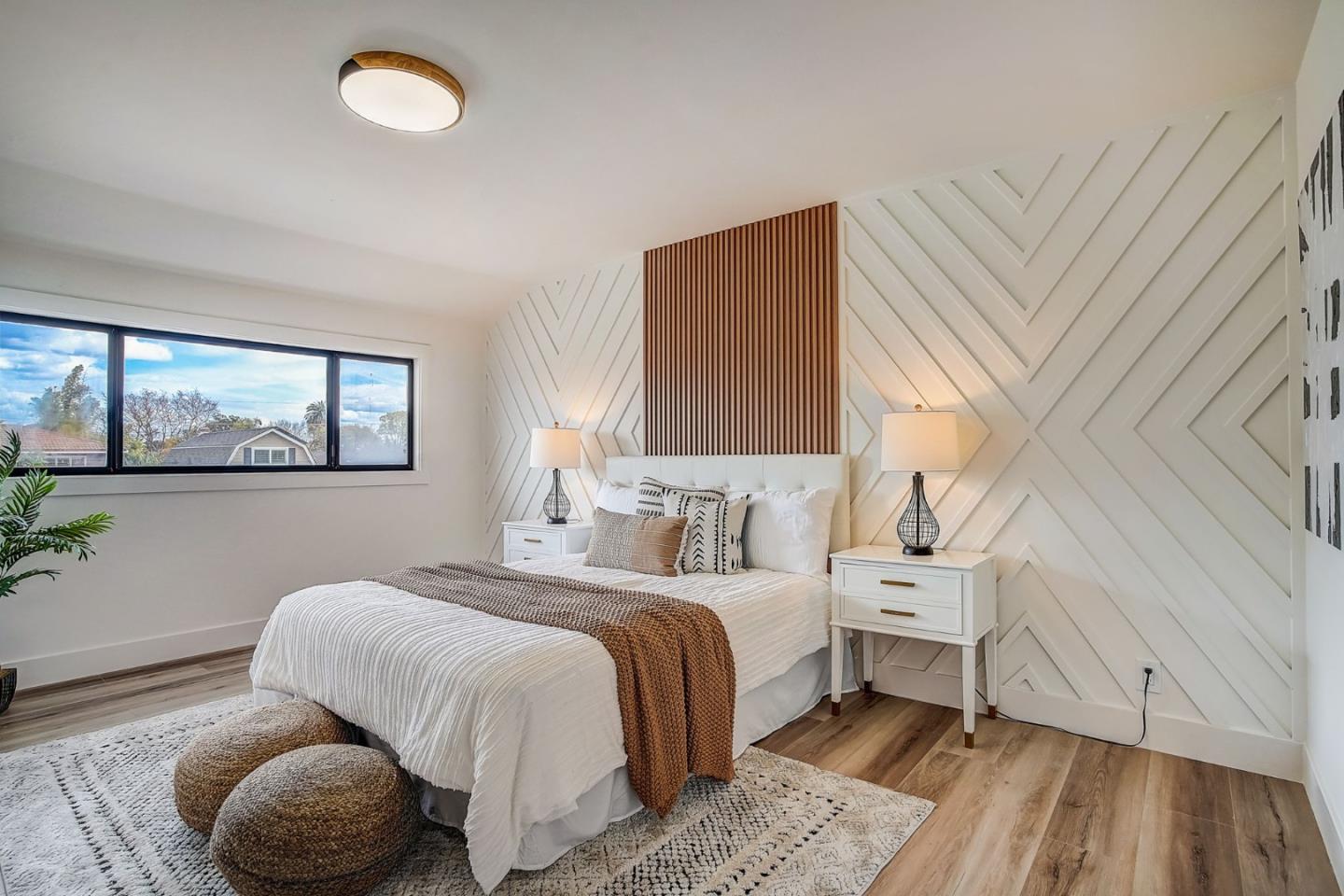 1237 Collins Lane San Jose, CA 95129 - Photo 34 of 56 a bedroom with a bed and window