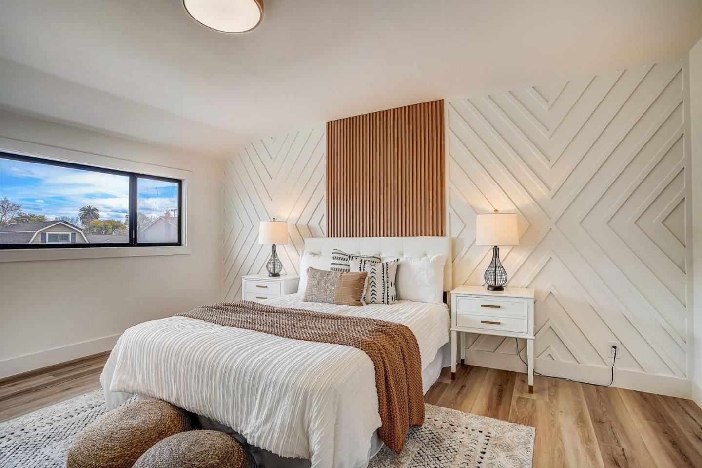 1237 Collins Lane San Jose, CA 95129 - Photo 37 of 56 a bedroom with a bed and wooden floor