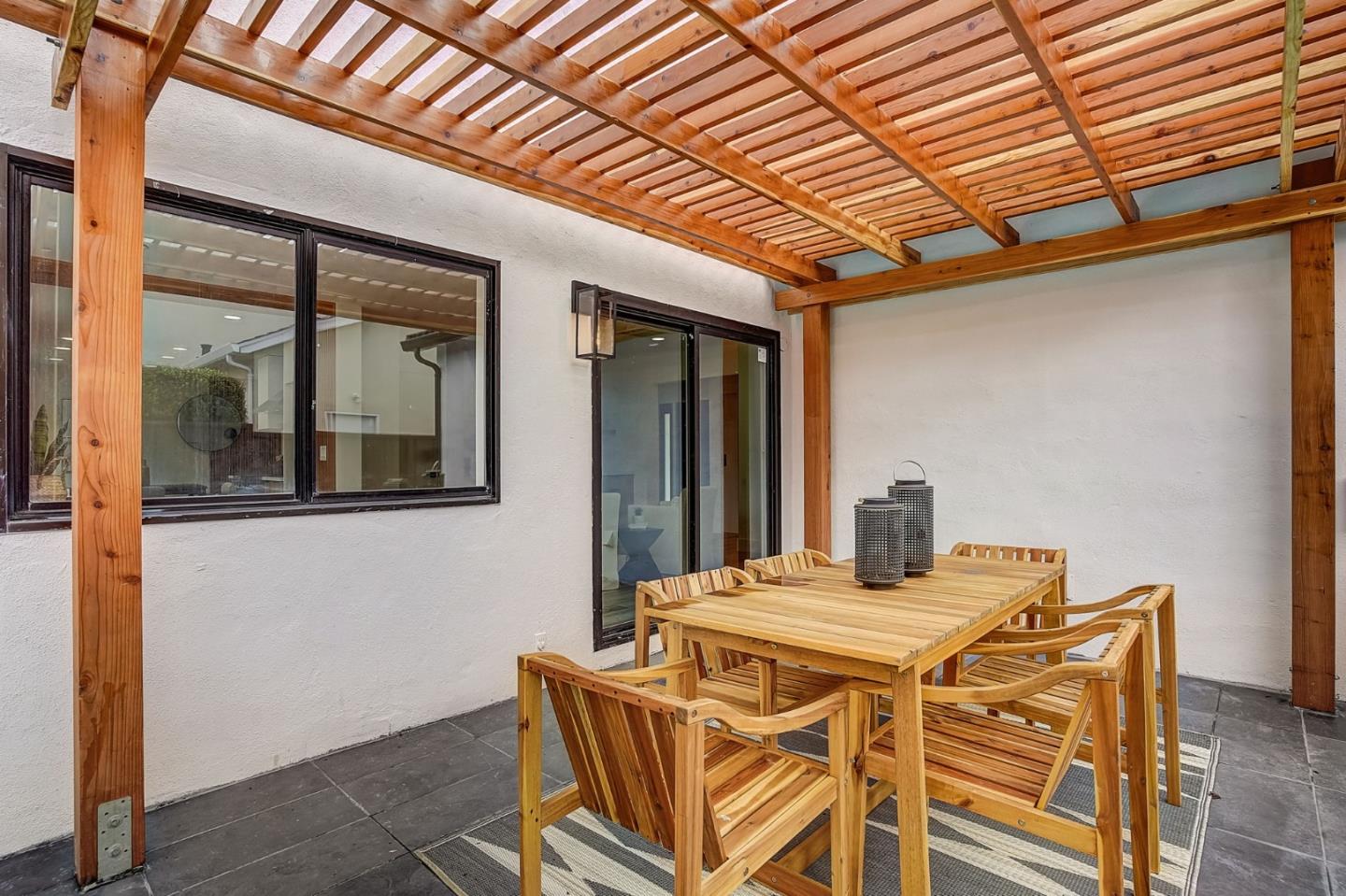 1237 Collins Lane San Jose, CA 95129 - Photo 46 of 56 a dining room with a table and chairs