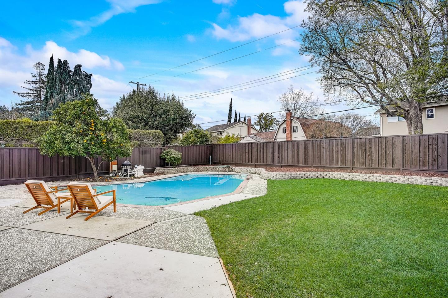 1237 Collins Lane San Jose, CA 95129 - Photo 49 of 56 a view of a backyard with swimming pool