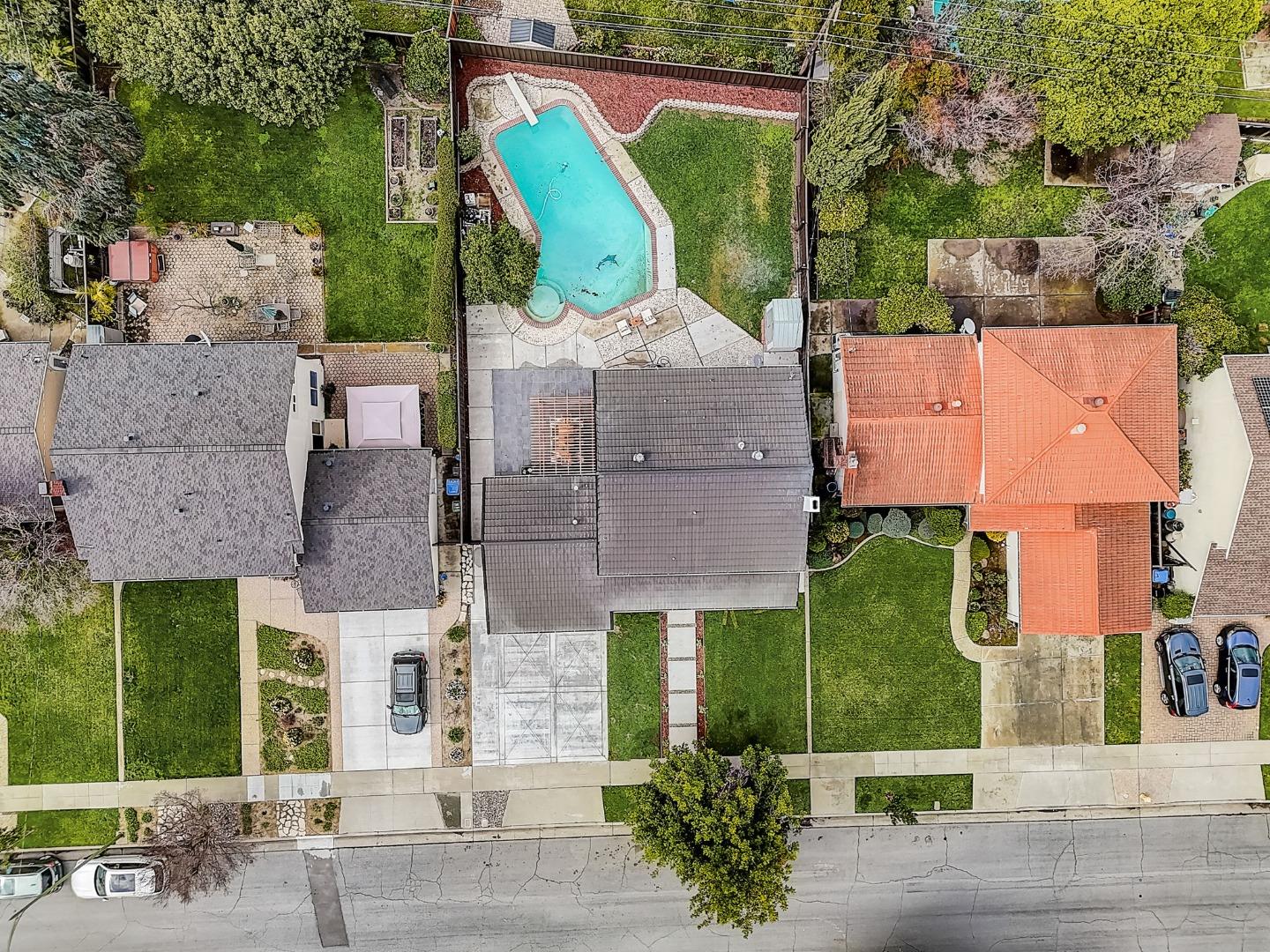 1237 Collins Lane San Jose, CA 95129 - Photo 53 of 56 an aerial view of multiple houses with outdoor space and parking