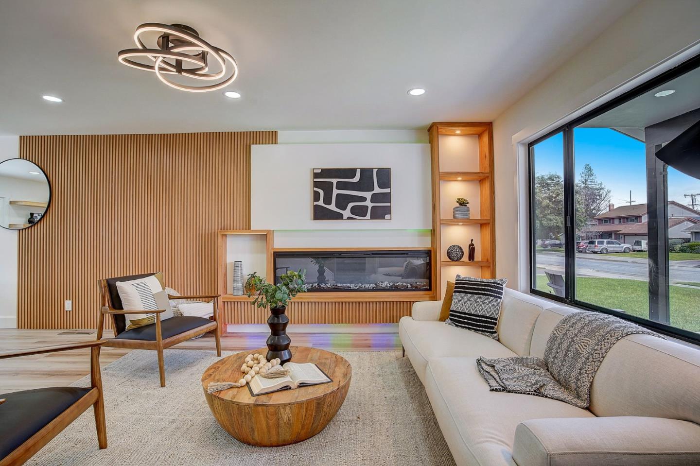 1237 Collins Lane San Jose, CA 95129 - Photo 8 of 56 a living room with furniture and a fireplace