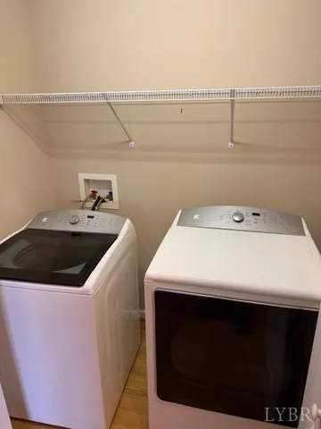 a utility room with dryer and washer