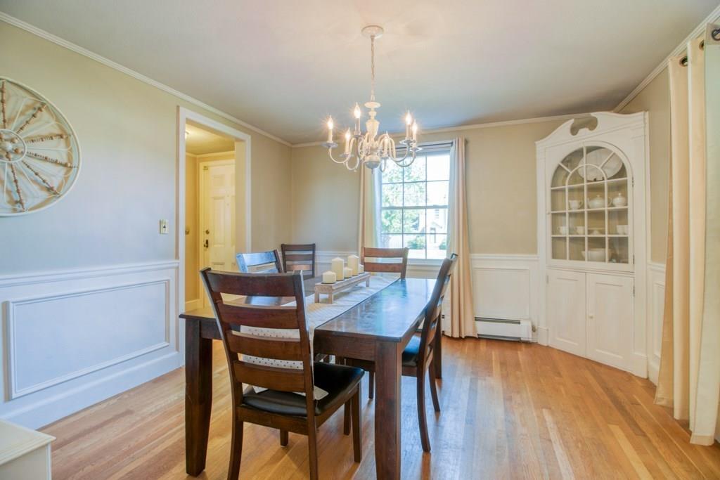 343 Plumtree Road Springfield, MA 01118 - Photo 8 of 27 a view of a dining room with furniture window and wooden floor