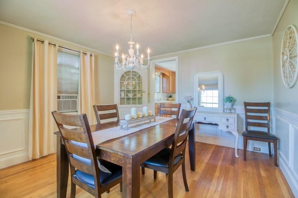 343 Plumtree Road Springfield, MA 01118 - Photo 10 of 27 a view of a dining room with furniture window and wooden floor