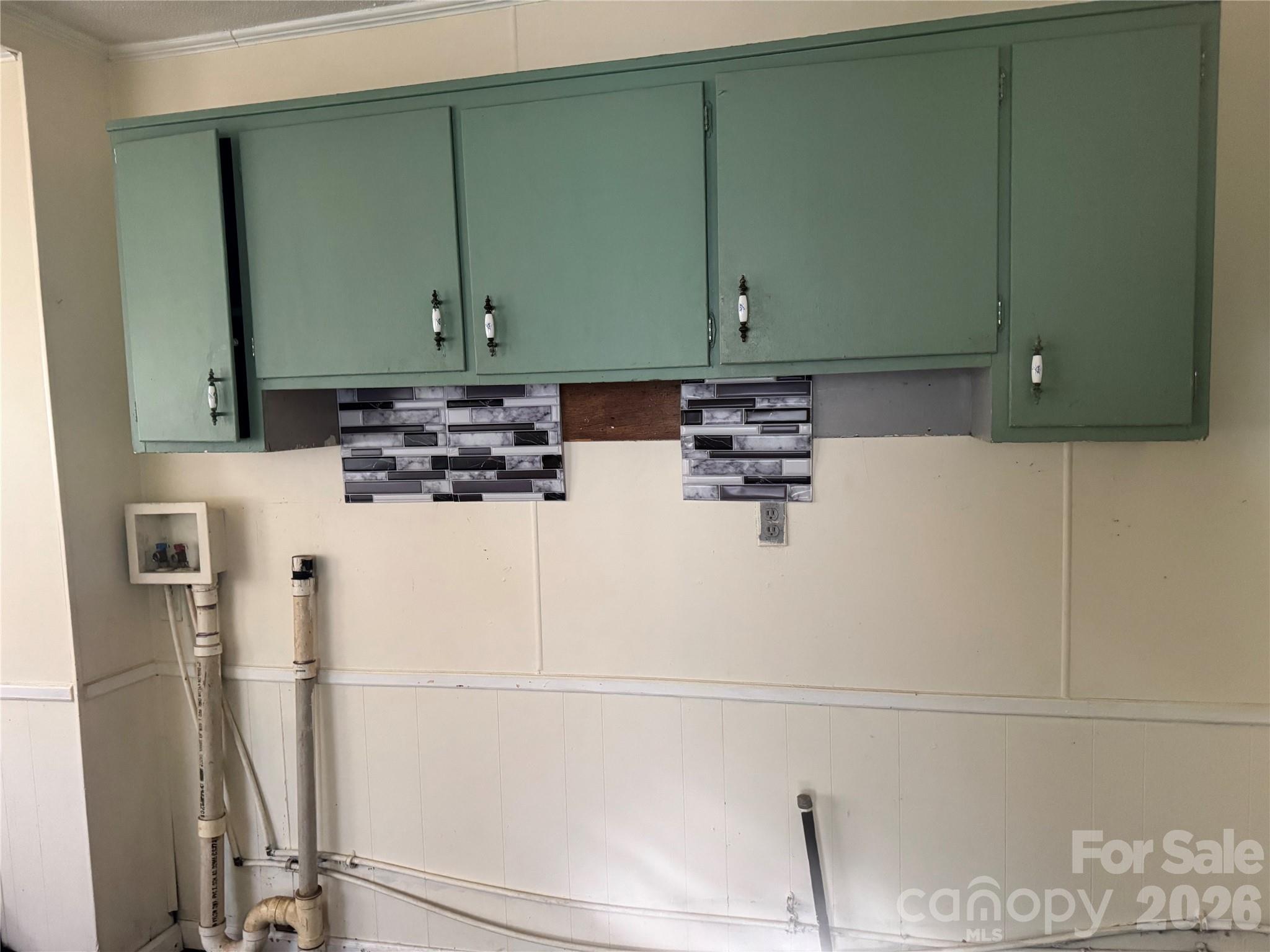 302 South Myrtle School Road Gastonia, NC 28052 - Photo 14 of 27 a close view of a refrigerator and cabinets