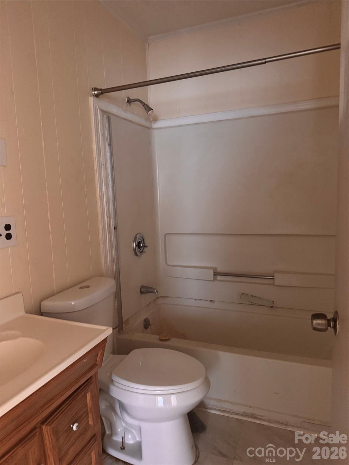 302 South Myrtle School Road Gastonia, NC 28052 - Photo 19 of 27 a bathroom with a sink a toilet and shower