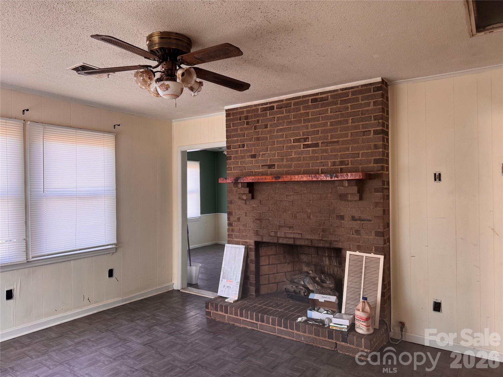 302 South Myrtle School Road Gastonia, NC 28052 - Photo 23 of 27 a view of a livingroom with a fireplace and window