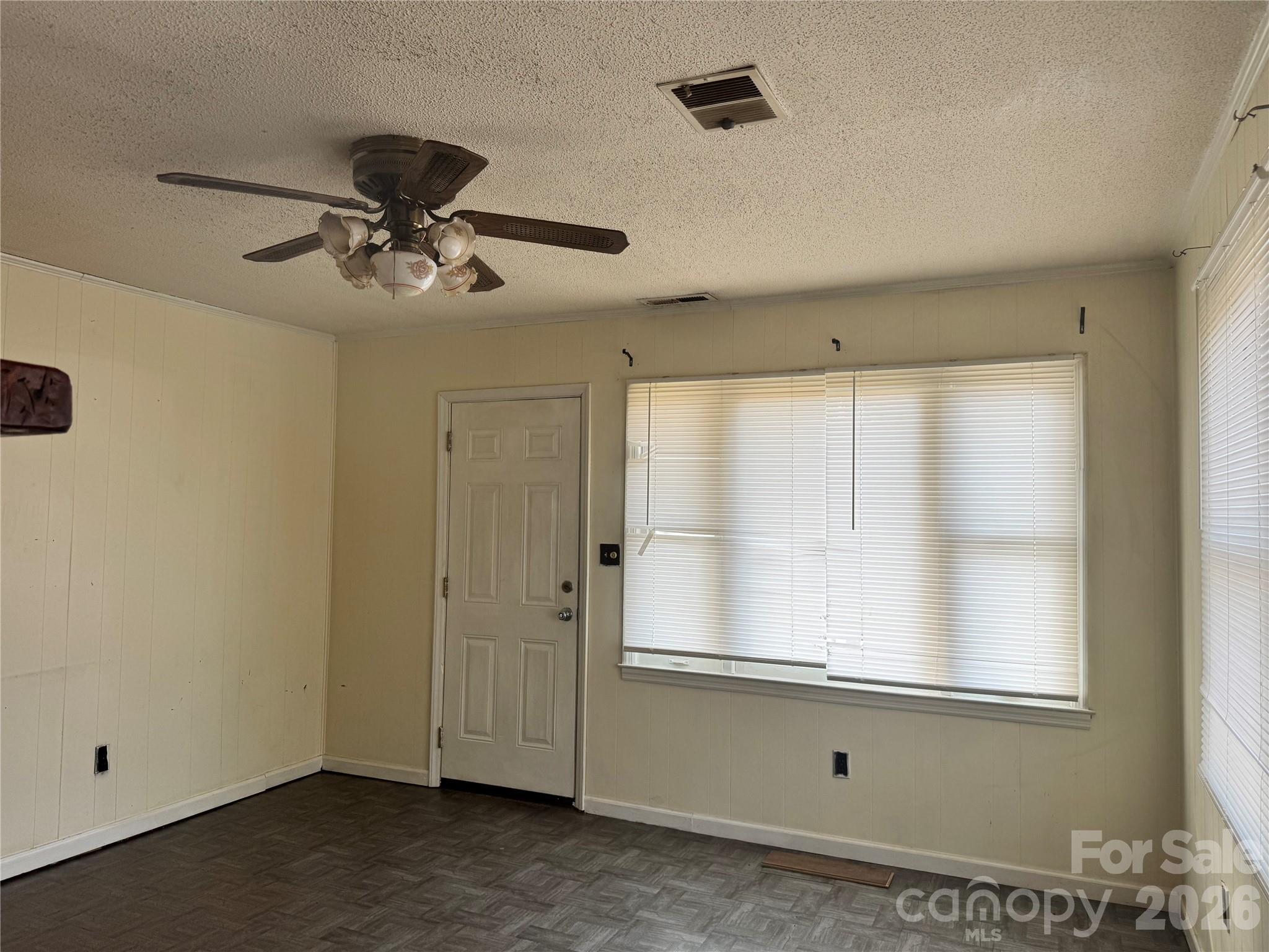 302 South Myrtle School Road Gastonia, NC 28052 - Photo 9 of 27 a view of empty room with window and ceiling fan