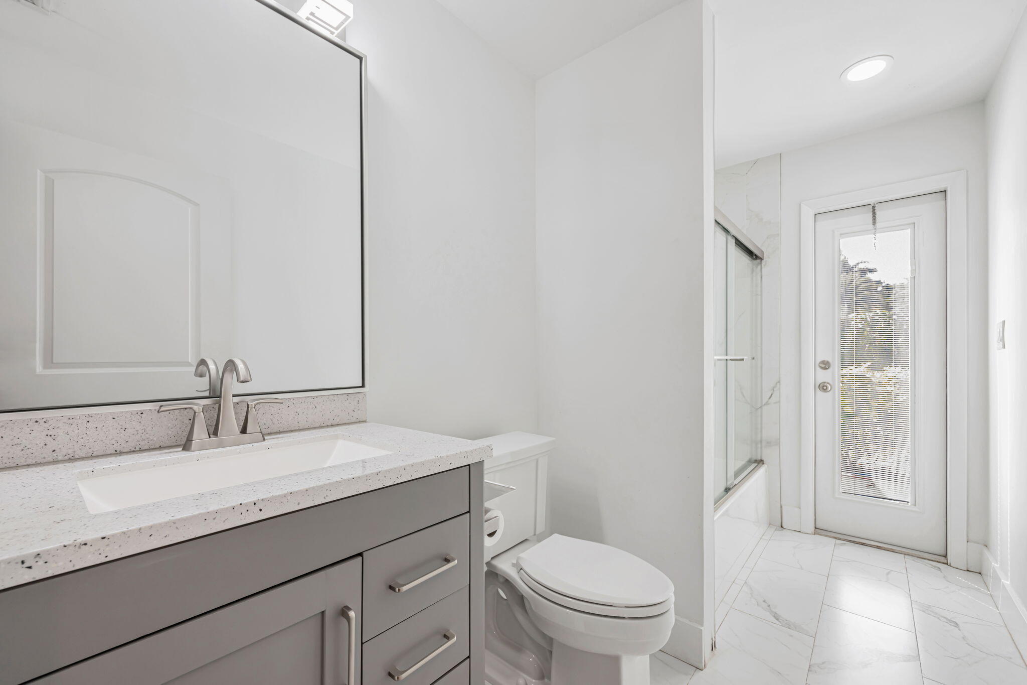 21356 Summertrace Circle Boca Raton, FL 33428 - Photo 26 of 33 a bathroom with a granite countertop sink a toilet and shower