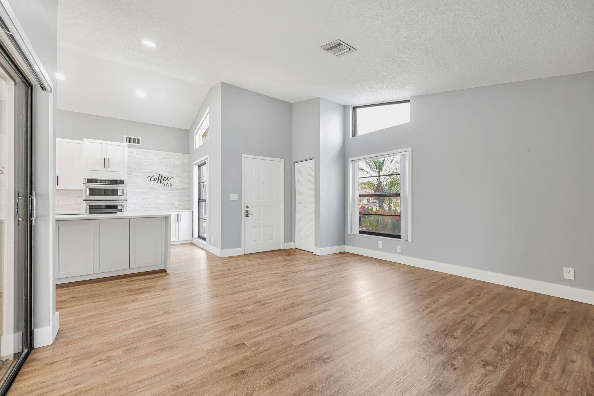 21356 Summertrace Circle Boca Raton, FL 33428 - Photo 9 of 33 a view of kitchen with wooden floor electronic appliances and window