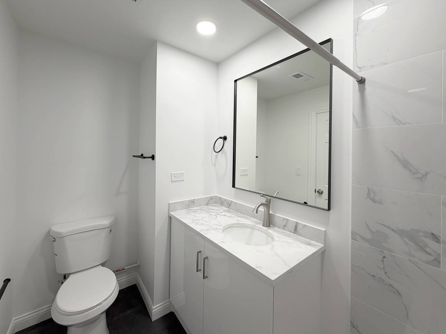 2982 South Lyman Street Chicago, IL 60608 - Photo 29 of 30 a bathroom with a toilet sink and mirror
