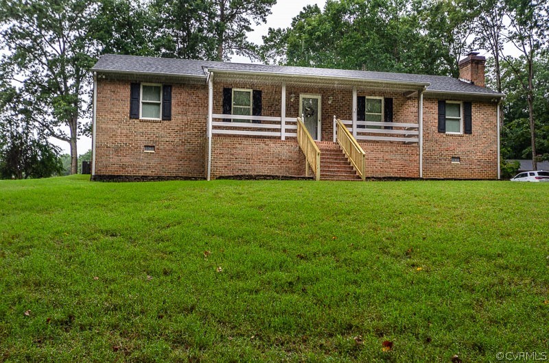 619 Broad St Road Manakin-Sabot, VA 23103 - Photo 1 of 49 a view of a house with a backyard