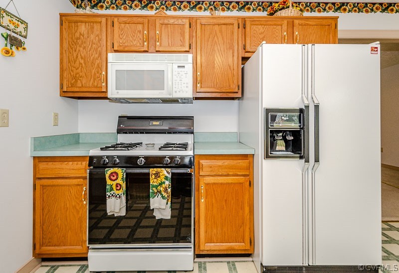 619 Broad St Road Manakin-Sabot, VA 23103 - Photo 15 of 49 a kitchen with stainless steel appliances granite countertop a refrigerator and a stove