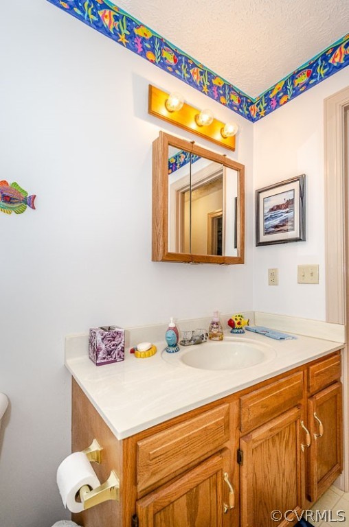 619 Broad St Road Manakin-Sabot, VA 23103 - Photo 21 of 49 a bathroom with a sink and a mirror