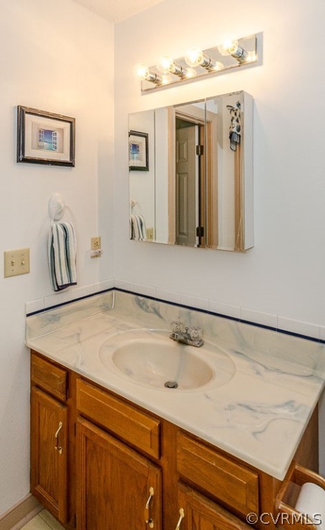 619 Broad St Road Manakin-Sabot, VA 23103 - Photo 23 of 49 a bathroom with a sink and a mirror