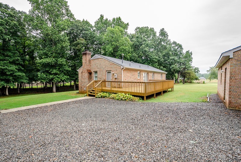 619 Broad St Road Manakin-Sabot, VA 23103 - Photo 34 of 49 a house with a field in front of it