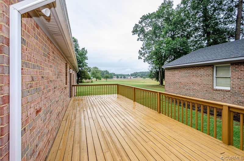 619 Broad St Road Manakin-Sabot, VA 23103 - Photo 35 of 49 a view of balcony with wooden floor and fence