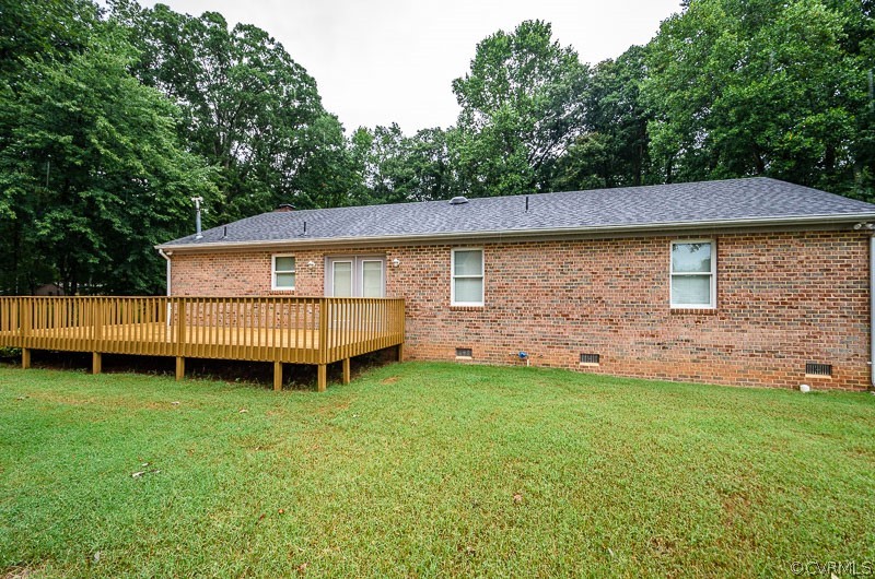 619 Broad St Road Manakin-Sabot, VA 23103 - Photo 37 of 49 a backyard of a house with table and chairs