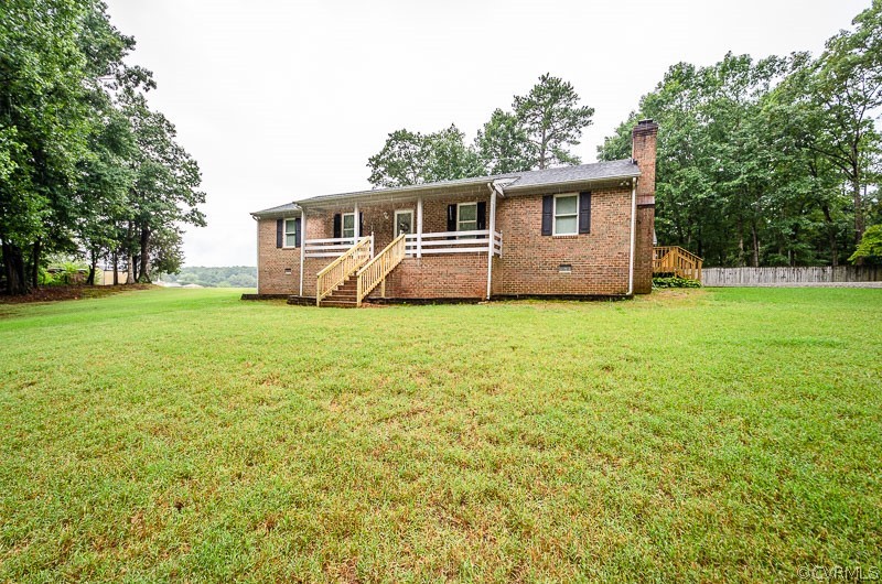 619 Broad St Road Manakin-Sabot, VA 23103 - Photo 39 of 49 a front view of a house with yard and green space