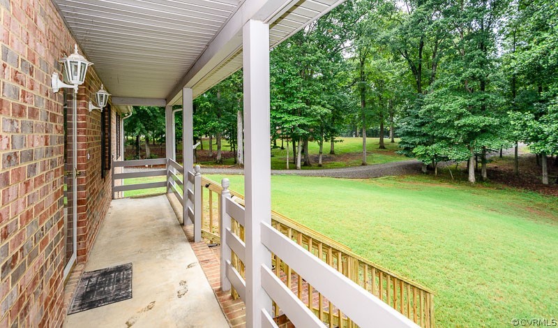 619 Broad St Road Manakin-Sabot, VA 23103 - Photo 4 of 49 a view of swimming pool with a table and chairs next to a yard