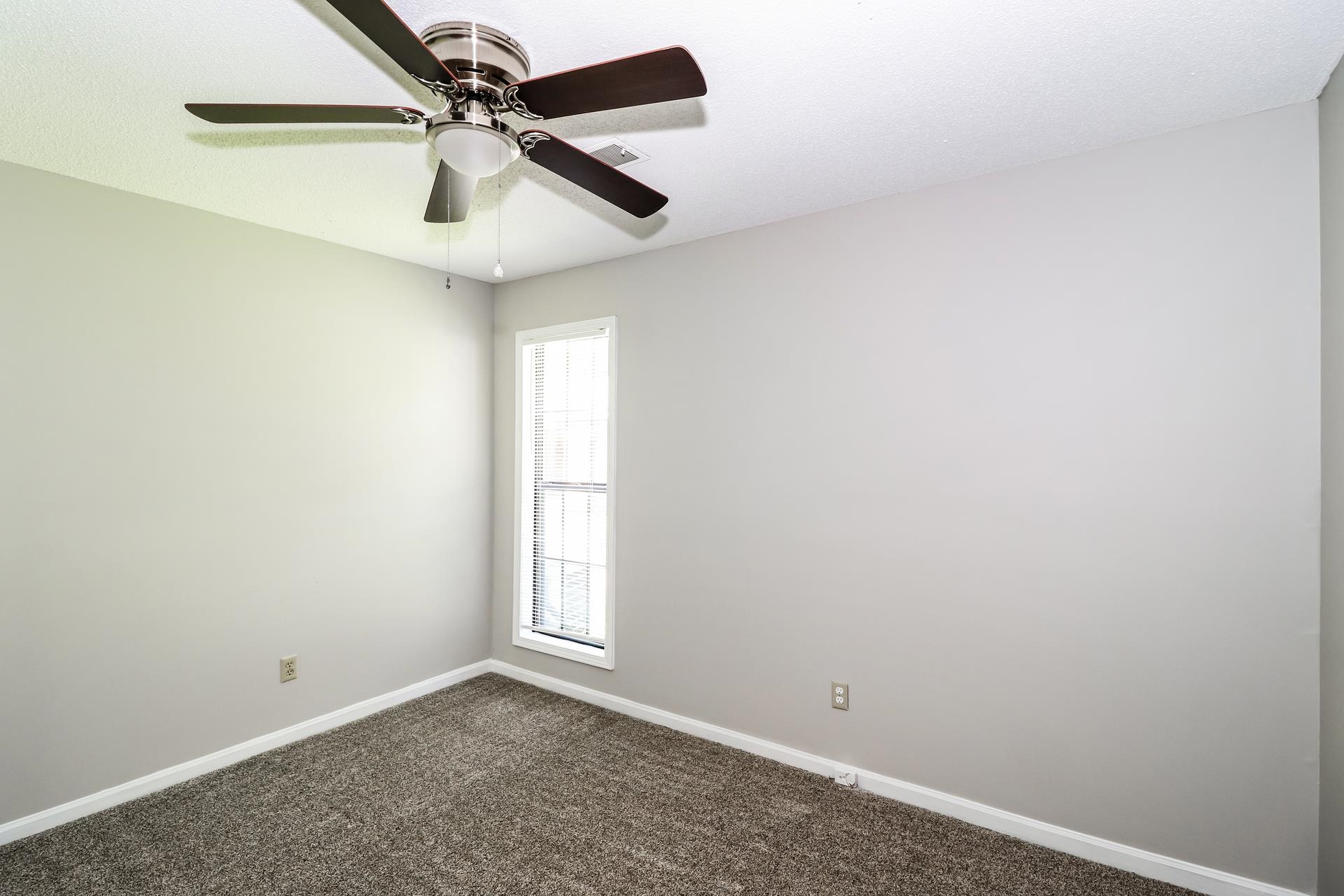 4475 Window Drive Memphis, TN 38135 - Photo 12 of 16 Unfurnished room with baseboards and carpet