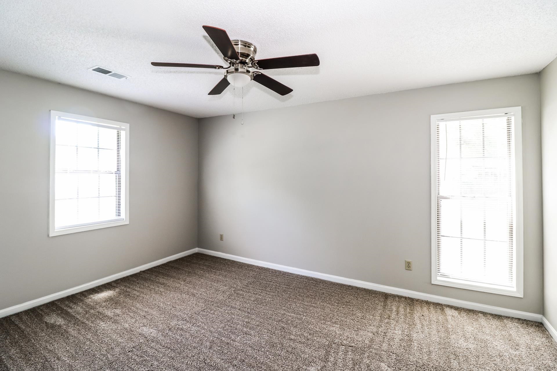 4475 Window Drive Memphis, TN 38135 - Photo 14 of 16 Spare room with carpet floors and ceiling fan