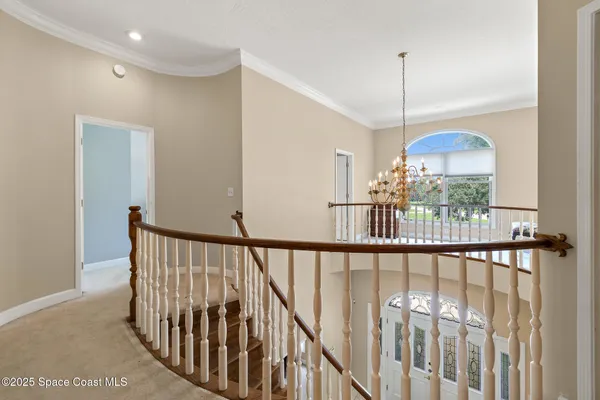 a kitchen with stainless steel appliances granite countertop a stove a microwave and a refrigerator