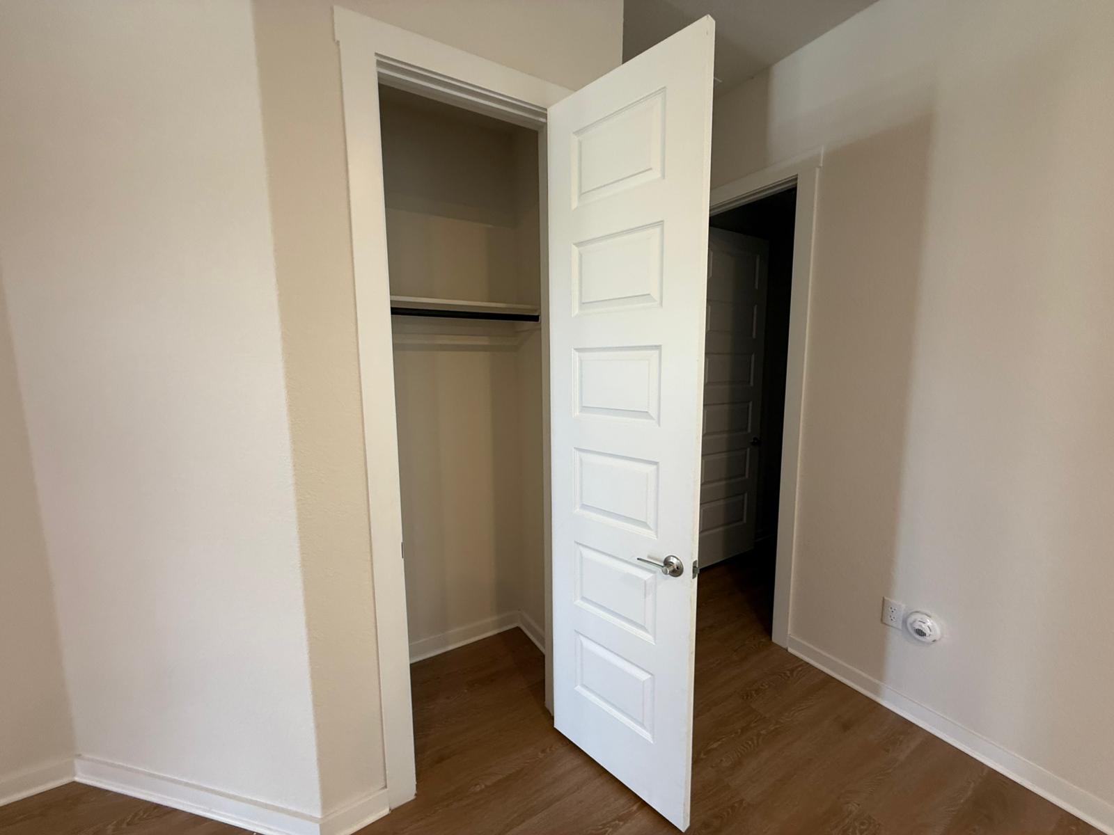 2037 Saddlery Street Leander, TX 78641 - Photo 24 of 38 wooden floor in an empty room