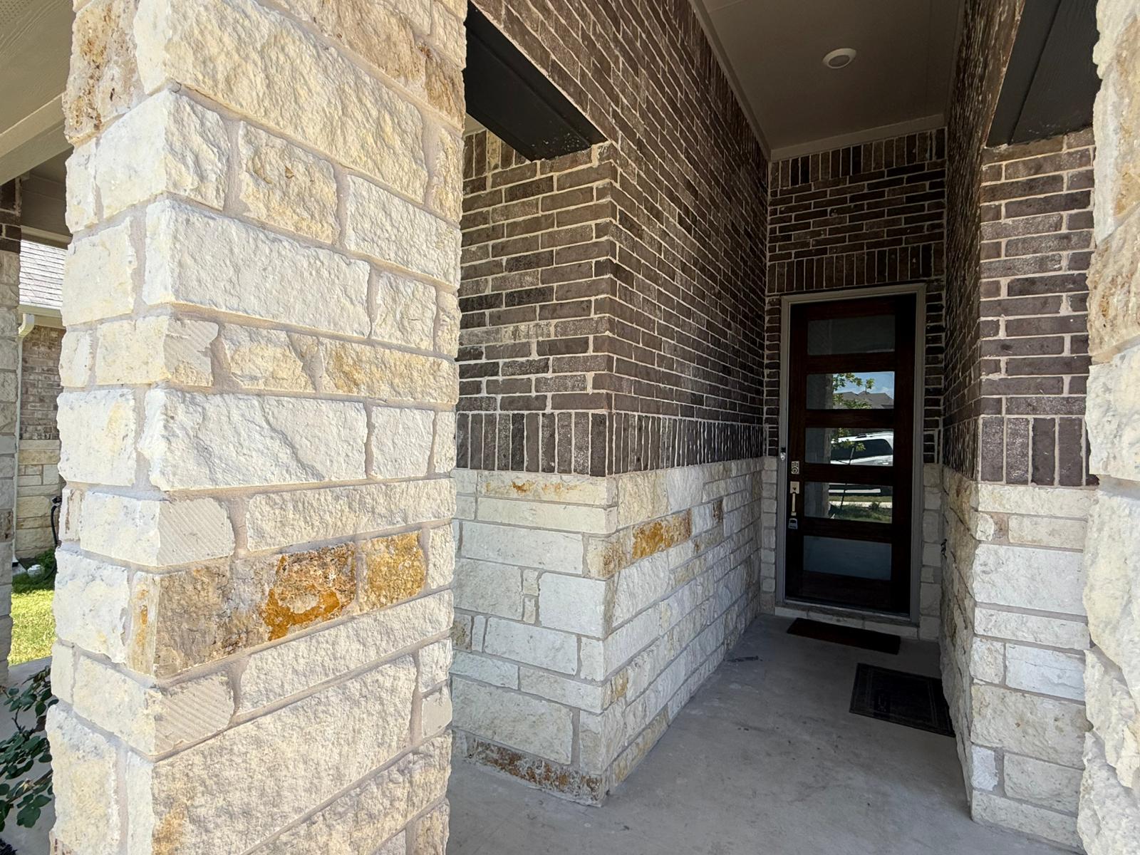 2037 Saddlery Street Leander, TX 78641 - Photo 37 of 38 a view of wooden door and outdoor space