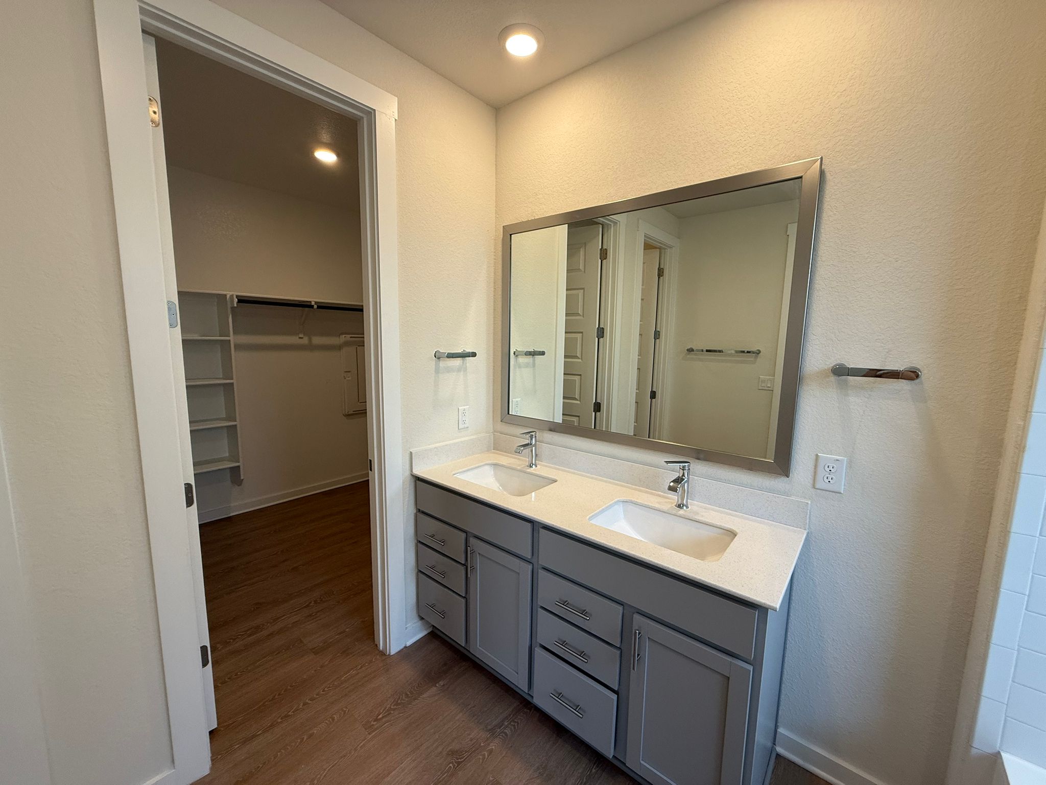2037 Saddlery Street Leander, TX 78641 - Photo 8 of 38 a bathroom with a double vanity sink and mirror