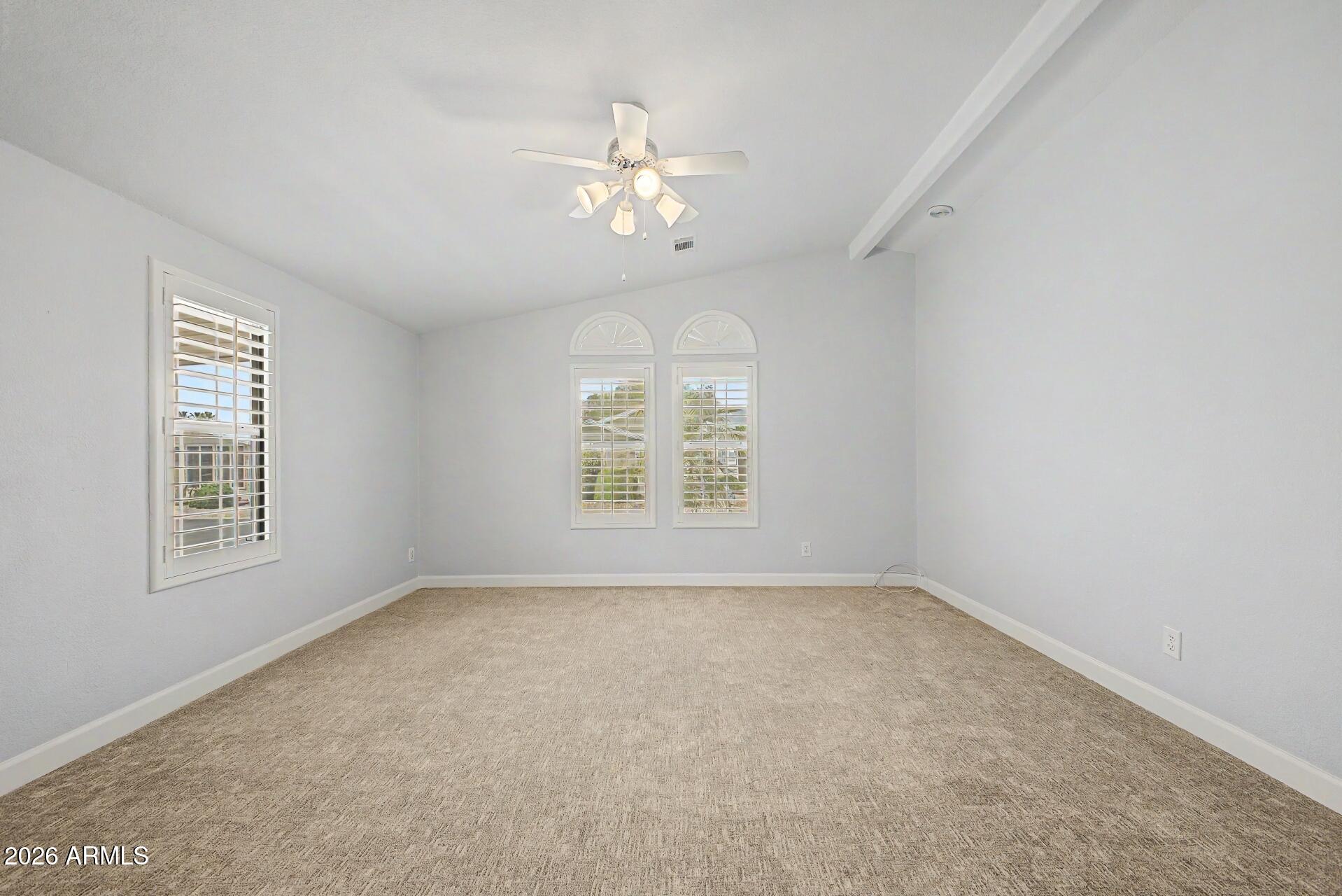 2550 South Ellsworth Road, Unit 50 Mesa, AZ 85209 - Photo 15 of 45 a view of an empty room with a window