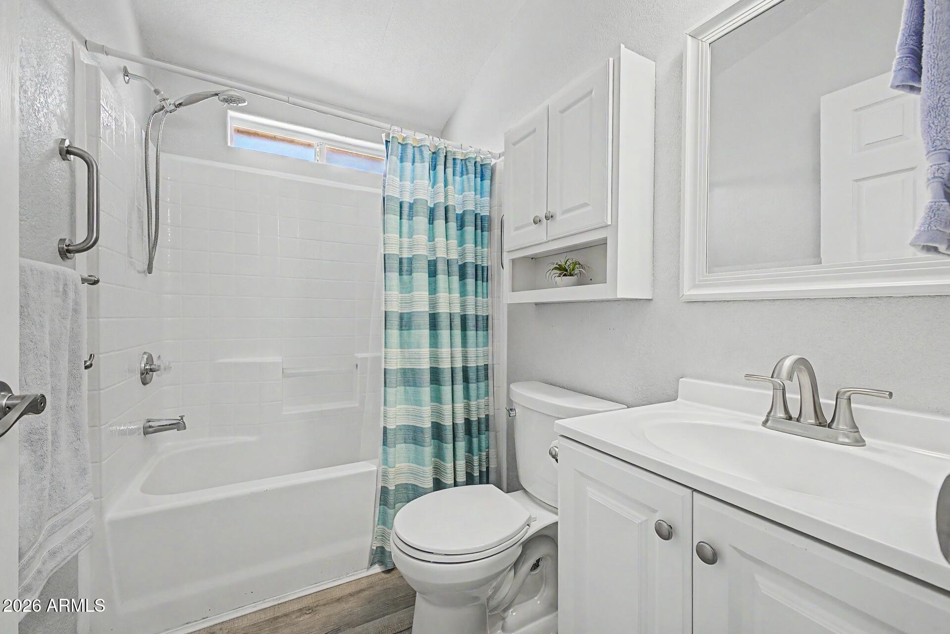 2550 South Ellsworth Road, Unit 50 Mesa, AZ 85209 - Photo 25 of 45 a bathroom with a sink toilet and shower