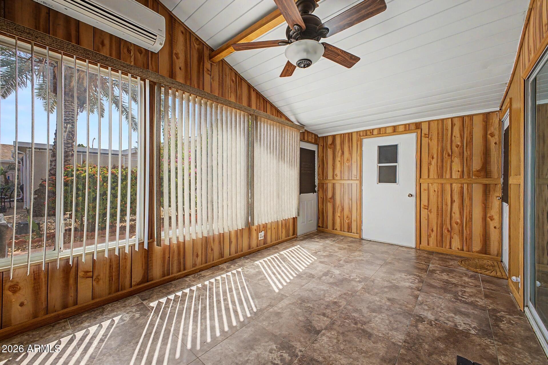 2550 South Ellsworth Road, Unit 50 Mesa, AZ 85209 - Photo 26 of 45 a view of a porch with wooden floor