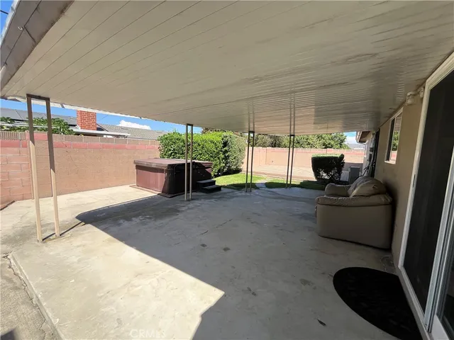 a view of roof with sitting area