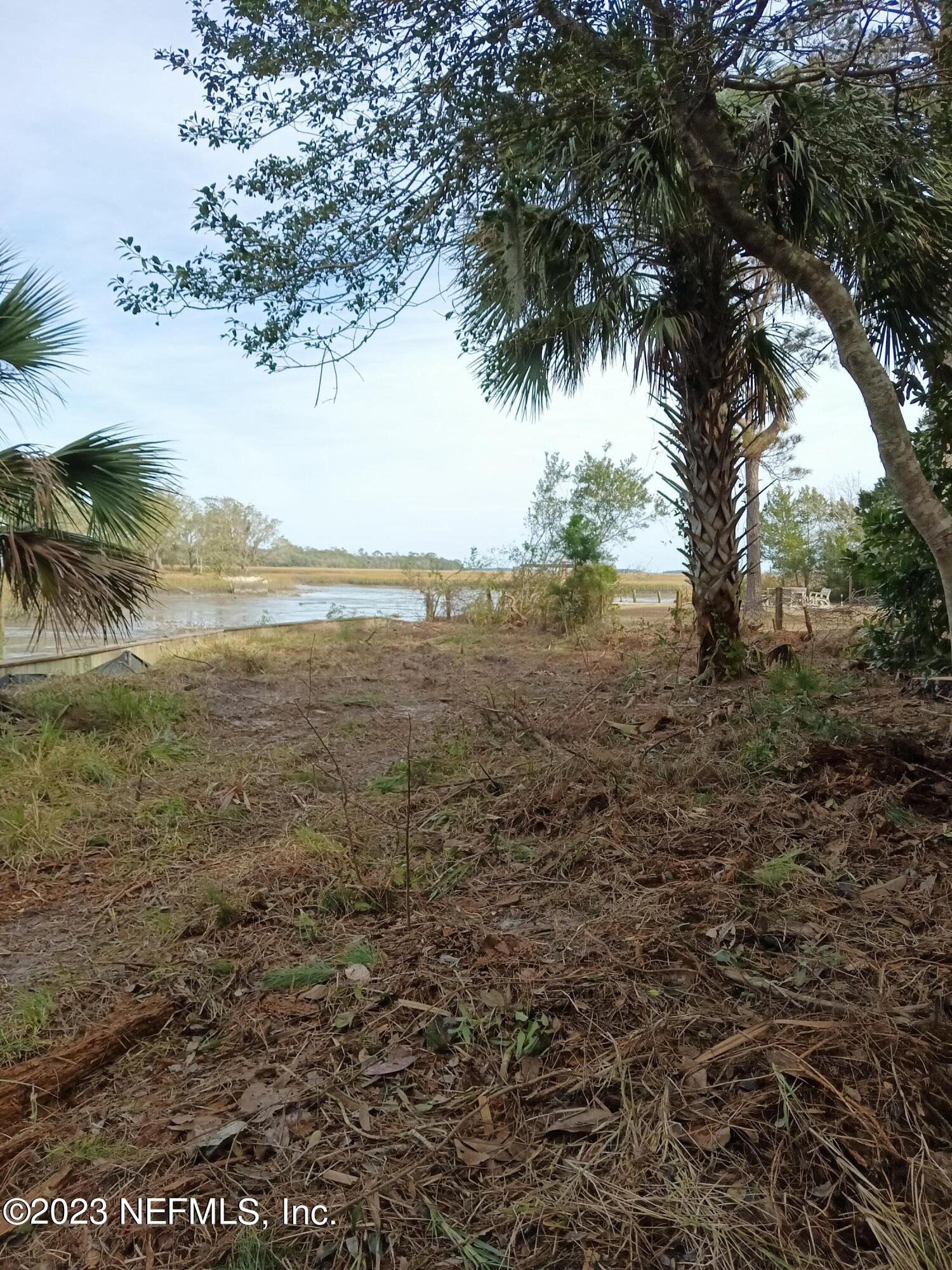 97612 Pirates Point Road Yulee, FL 32097 - Photo 6 of 23 a view of an ocean beach
