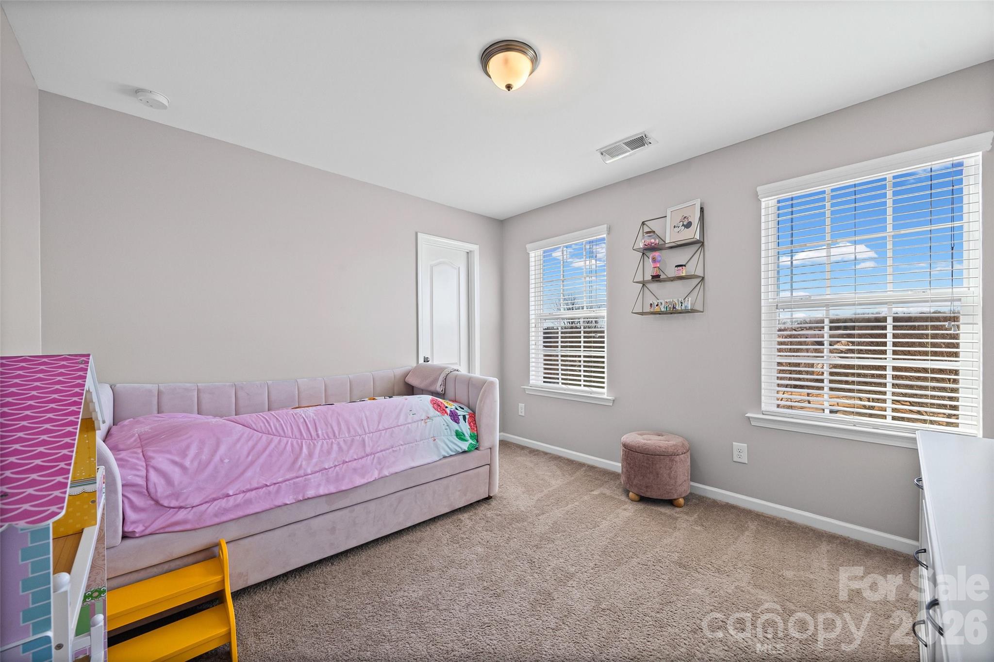 4470 Haddington Drive Indian Land, SC 29707 - Photo 19 of 27 a bedroom with a bed and a window