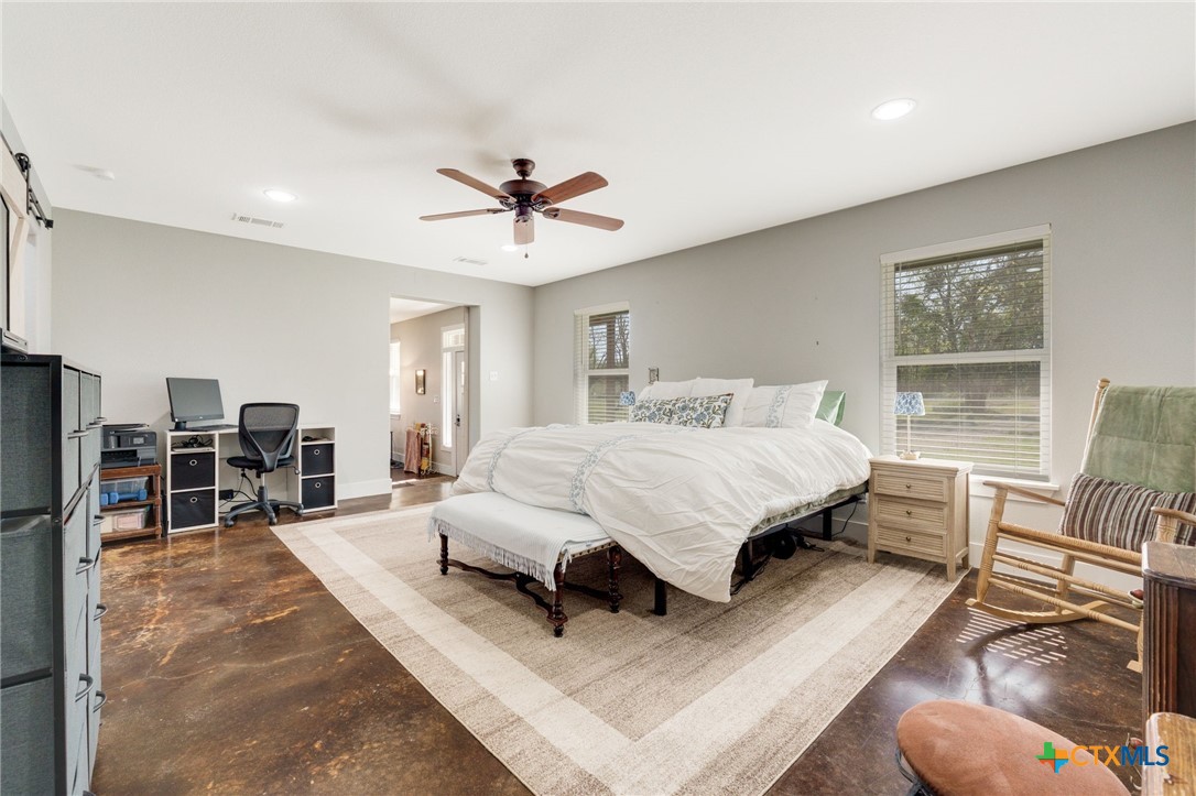469 Whispering Oaks Loop Killeen, TX 76549 - Photo 17 of 48 a bedroom with a bed furniture and a window