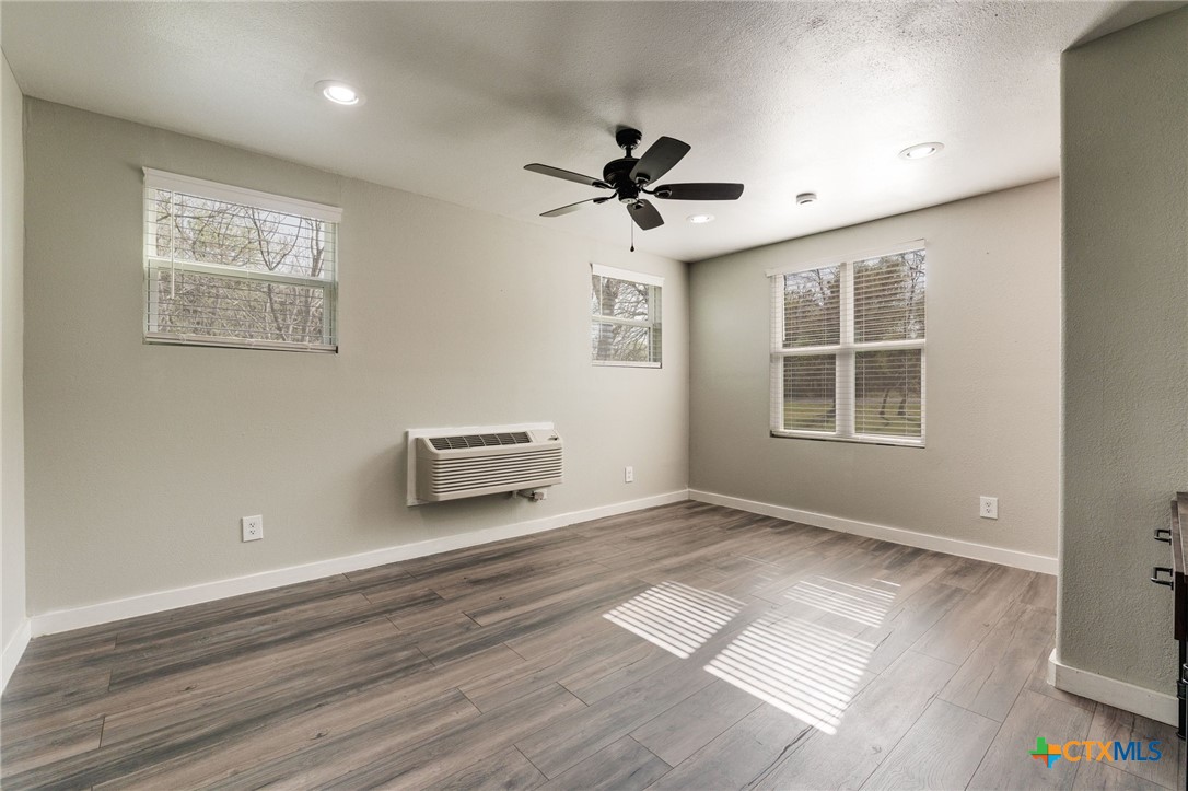 469 Whispering Oaks Loop Killeen, TX 76549 - Photo 23 of 48 a view of livingroom with hardwood floor and ceiling fan