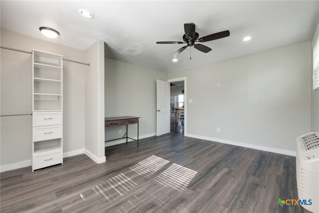 469 Whispering Oaks Loop Killeen, TX 76549 - Photo 24 of 48 a view of empty room with wooden floor