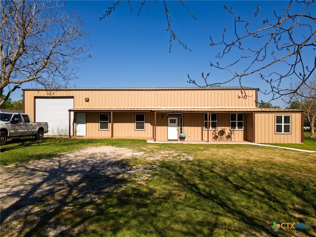 469 Whispering Oaks Loop Killeen, TX 76549 - Photo 3 of 48 a front view of a house with a yard