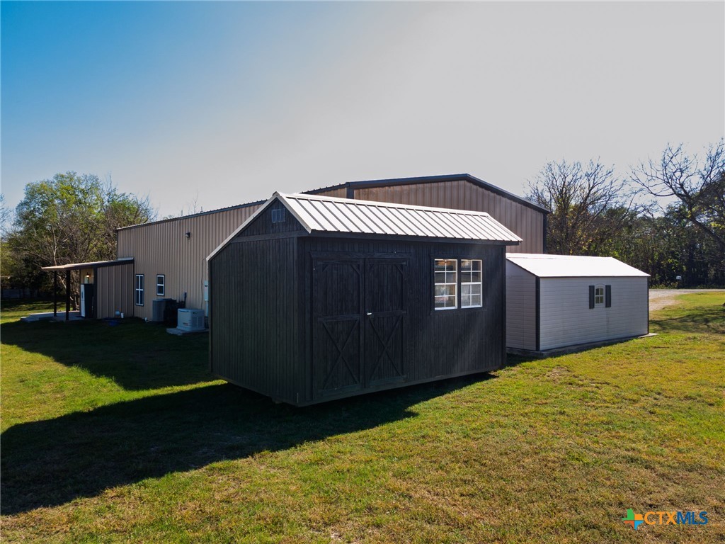 469 Whispering Oaks Loop Killeen, TX 76549 - Photo 32 of 48 a front view of a house with yard