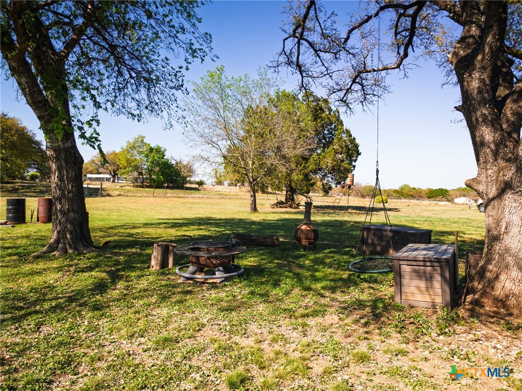 469 Whispering Oaks Loop Killeen, TX 76549 - Photo 37 of 48 a view of a lake with a yard