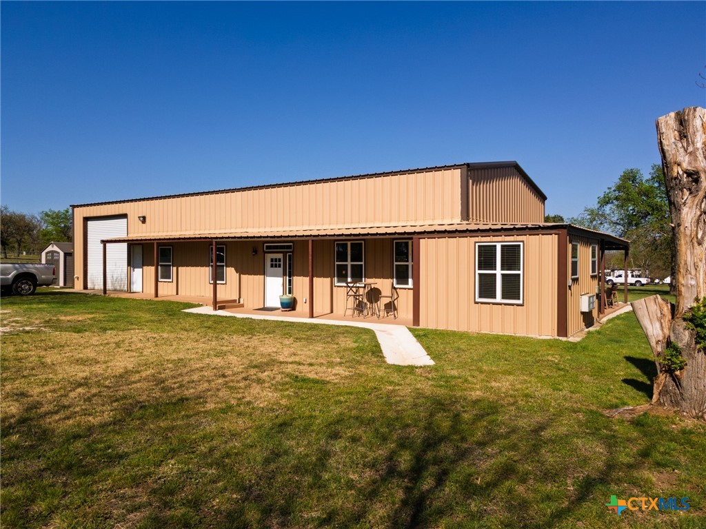 469 Whispering Oaks Loop Killeen, TX 76549 - Photo 4 of 48 a view of a house with pool and chairs