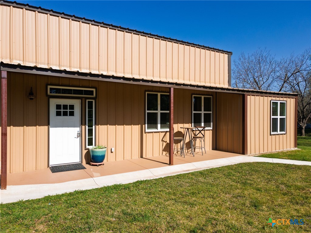 469 Whispering Oaks Loop Killeen, TX 76549 - Photo 6 of 48 a front view of a house with garden and patio